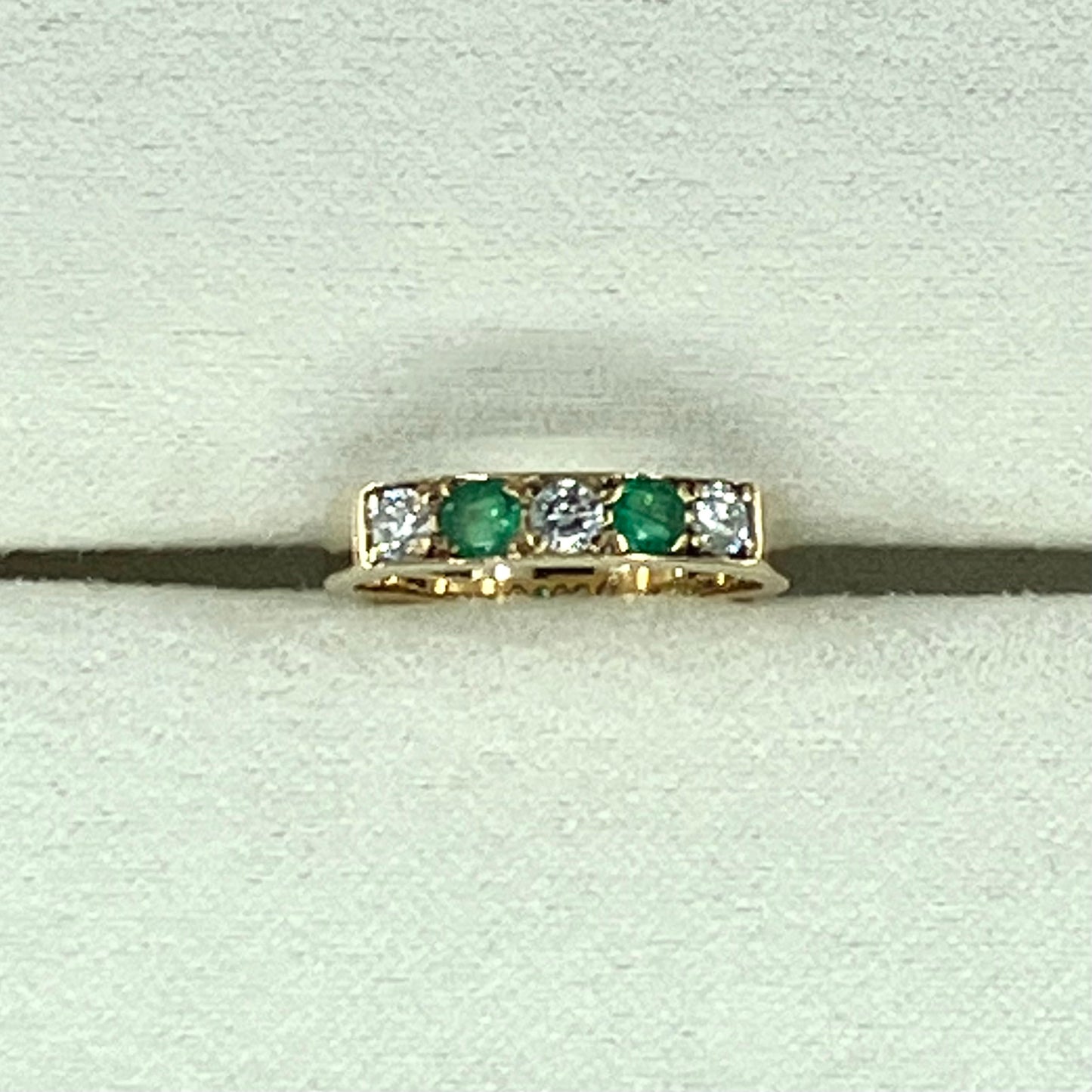 Emerald & diamond 9ct half-hoop ring