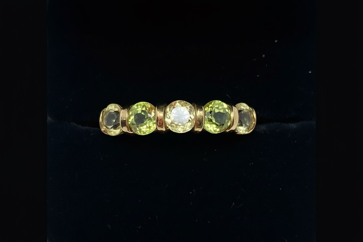 9ct gold 5-stone peridot ring