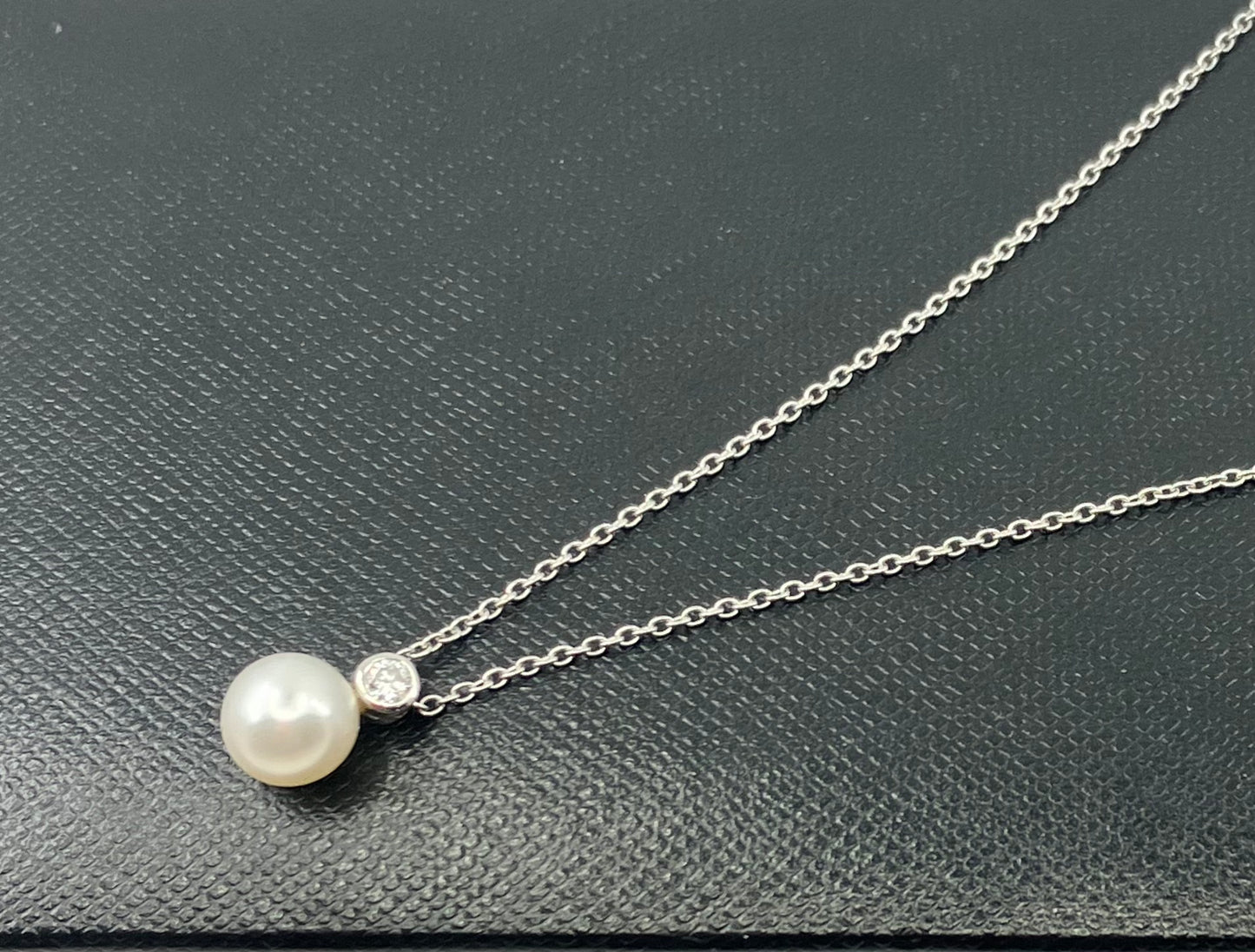 Cultured Pearl & Diamond pendant on a white 18ct gold chain.