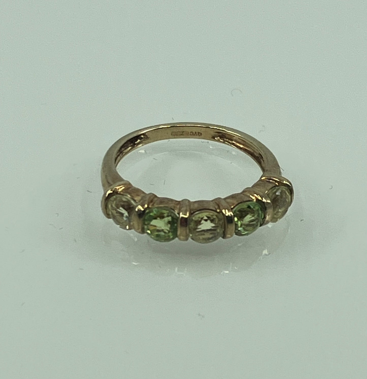 9ct gold 5-stone peridot ring