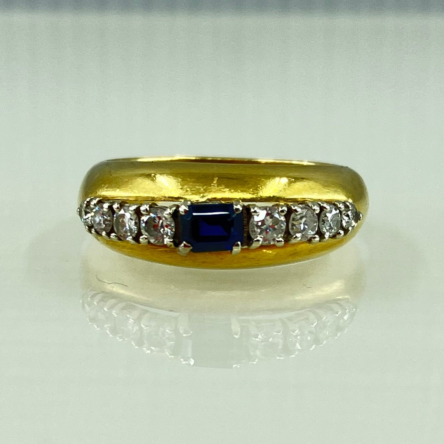 18ct gold bombé dress ring, with a sapphire & diamond tiara