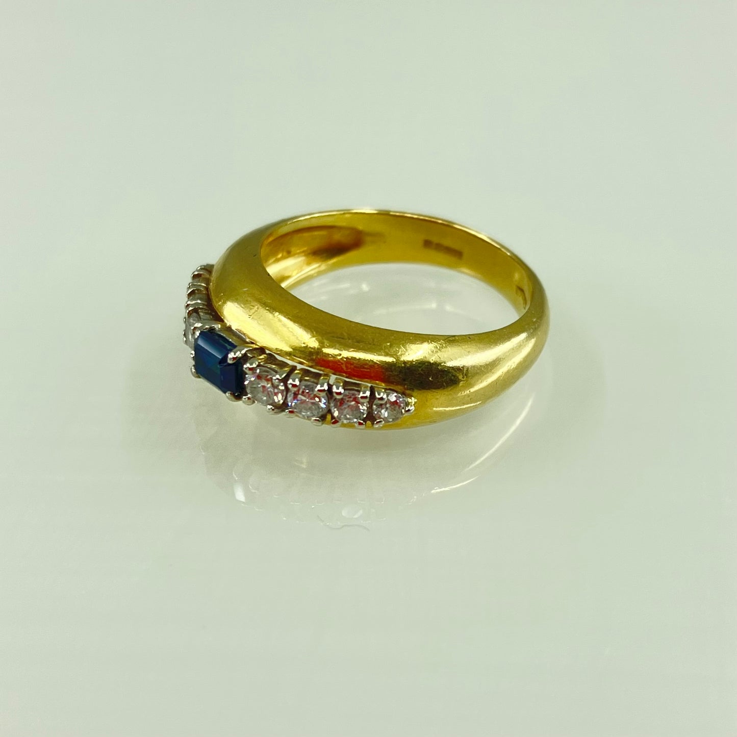 18ct gold bombé dress ring, with a sapphire & diamond tiara