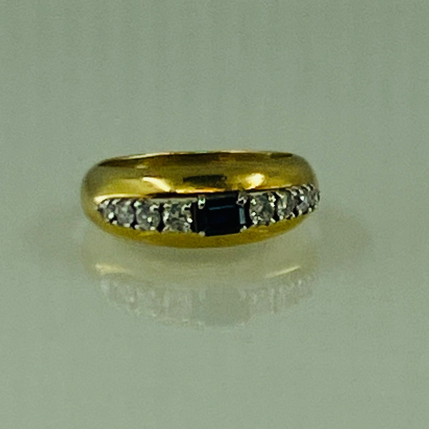 18ct gold bombé dress ring, with a sapphire & diamond tiara