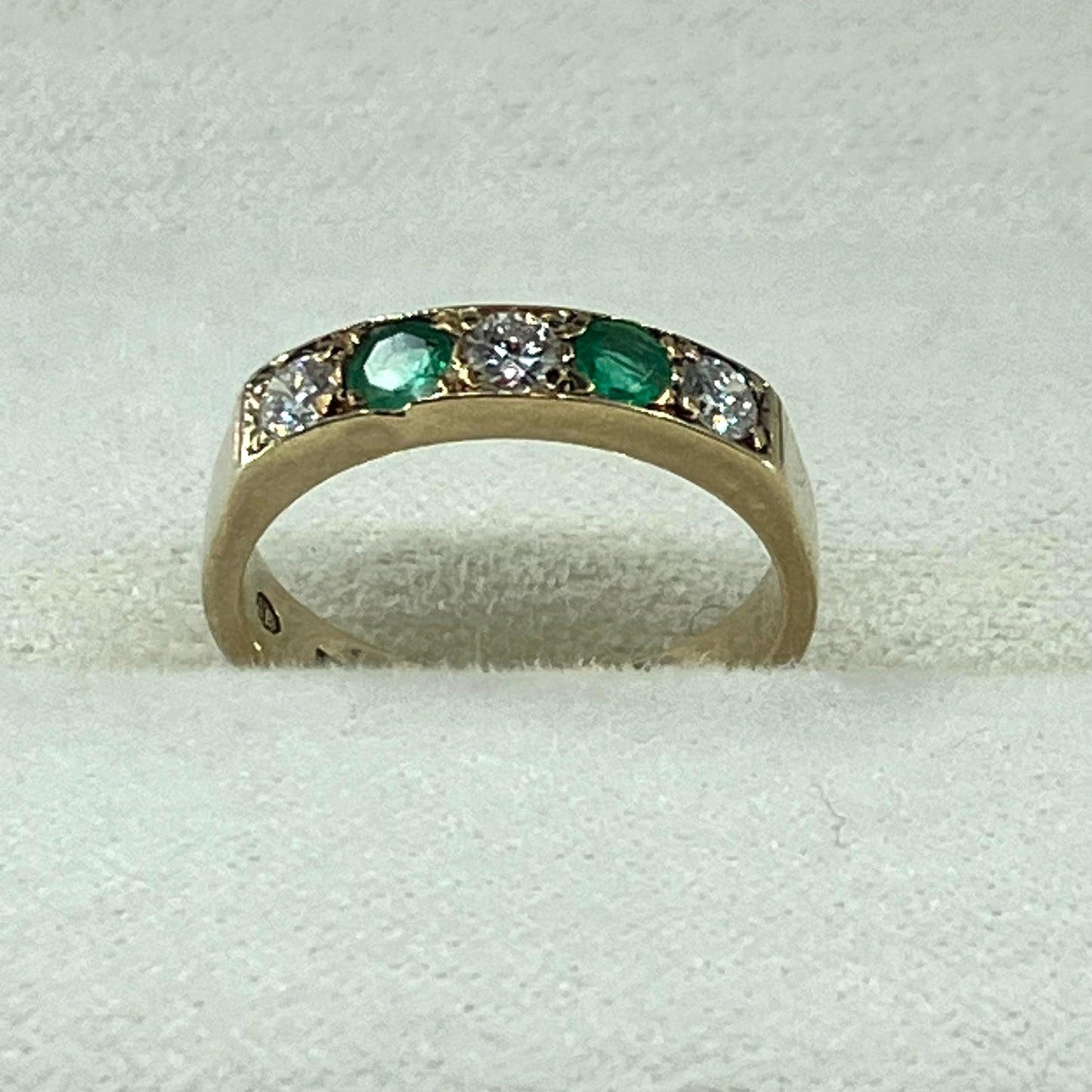 Emerald & diamond 9ct half-hoop ring