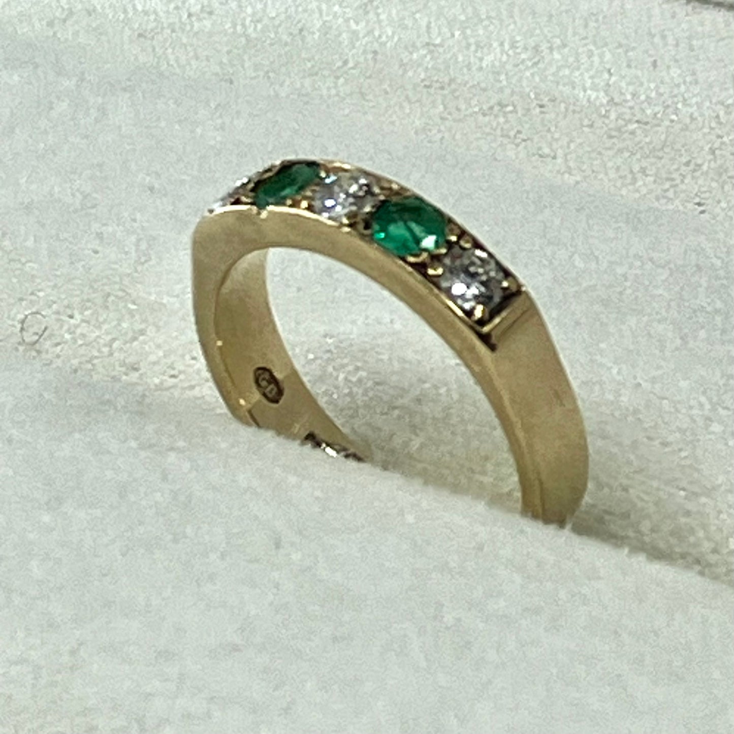 Emerald & diamond 9ct half-hoop ring